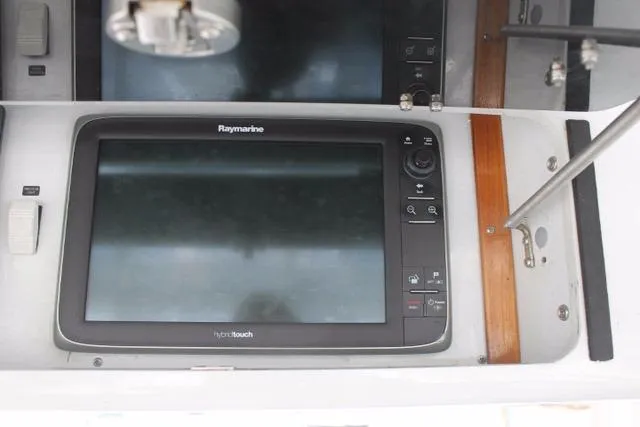 M.a.c. Daddy Yacht Photos Pics Raymarine display on 2005 Custom DeSanti Carolina Express boat dashboard.