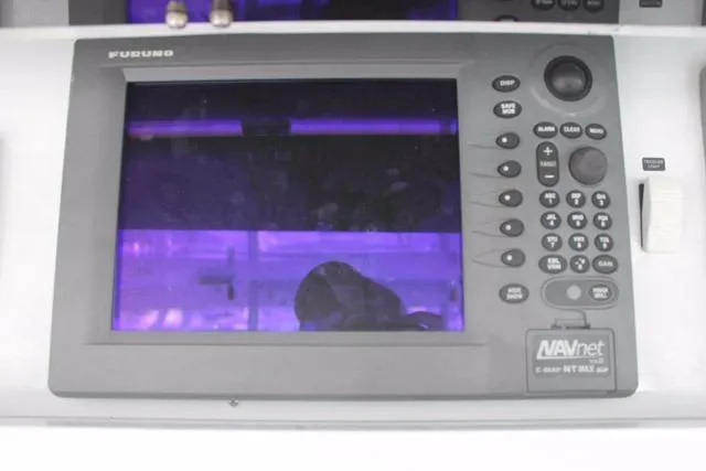 M.a.c. Daddy Yacht Photos Pics Furuno NAVnet marine GPS system on 2005 DeSanti Carolina Express boat dashboard.
