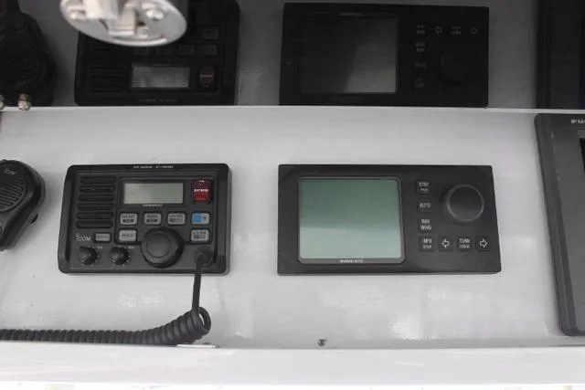 M.a.c. Daddy Yacht Photos Pics Control panel of a 2005 Custom DeSanti Carolina Express boat with navigation equipment.