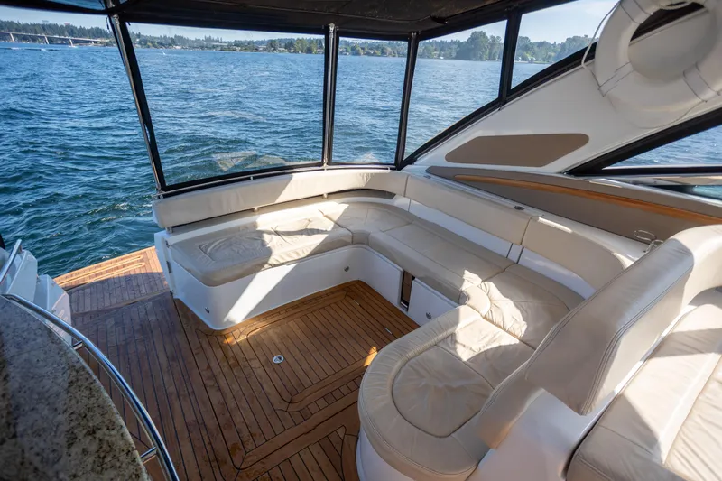  Yacht Photos Pics Luxurious interior of 2018 Cobalt 46 Yacht with spacious seating and scenic water view.