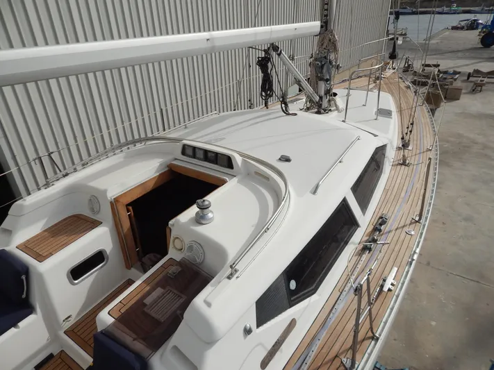  Yacht Photos Pics 1999 Oyster 42 Aft Cockpit Deck Saloon yacht with teak deck and open cockpit view.