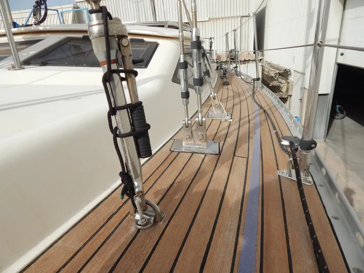  Yacht Photos Pics Deck of 1999 Oyster 42 Aft Cockpit Deck Saloon yacht with teak finish.