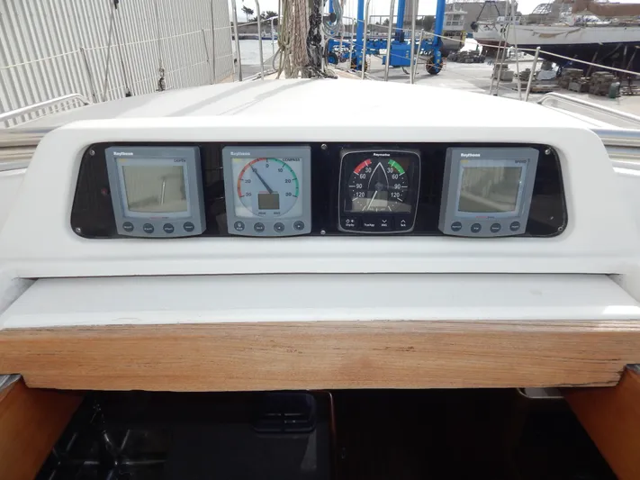  Yacht Photos Pics Cockpit instrument panel of 1999 Oyster 42 Aft Cockpit Deck Saloon yacht.