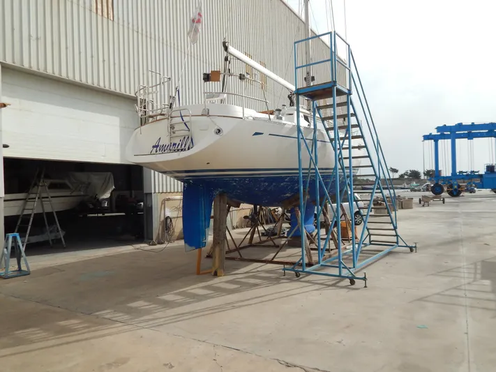  Yacht Photos Pics Sailboat Oyster 42 Aft Cockpit Deck Saloon 1999 in dry dock for maintenance.