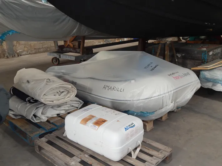  Yacht Photos Pics Stored boat equipment and wrapped dinghy beside Oyster 42 Aft Cockpit Deck Saloon, 1999 model.