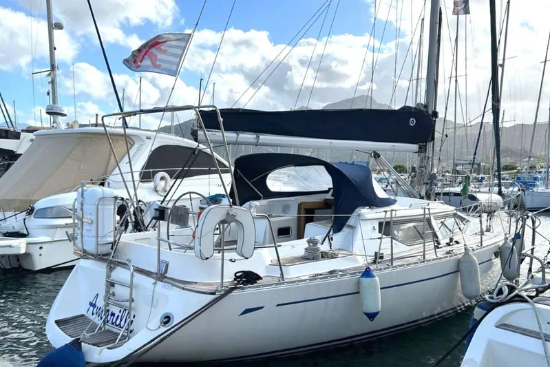  Yacht Photos Pics Sailing yacht Oyster 42 Aft Cockpit Deck Saloon, 1999, docked in a marina.