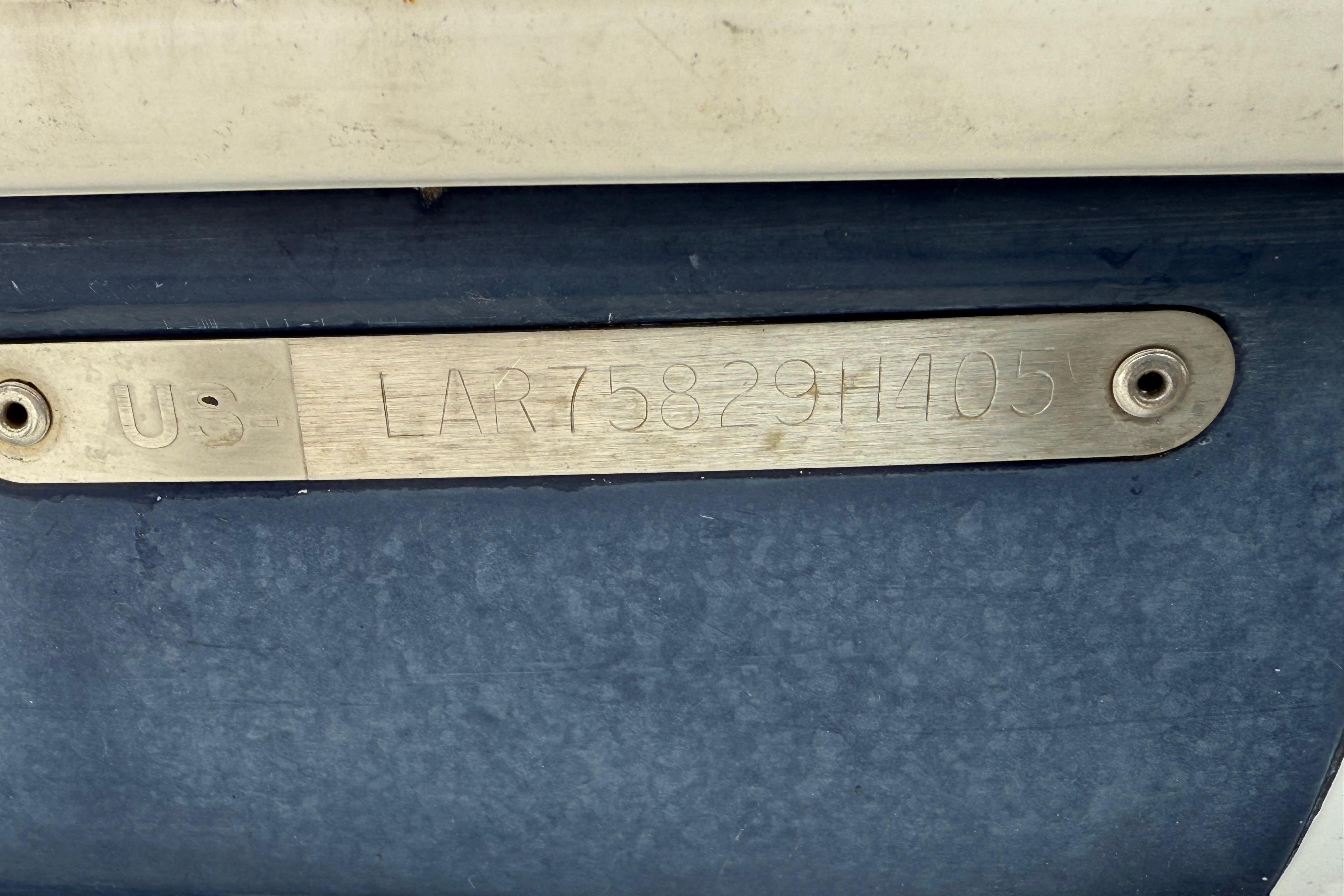 Hull identification number on 2005 Larson Cabrio 290 boat.