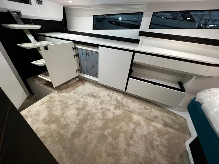 Fiart 39 Sw Yacht Photos Pics 2024 Fiart 39 Seawalker interior with modern cabinetry and carpeted flooring.