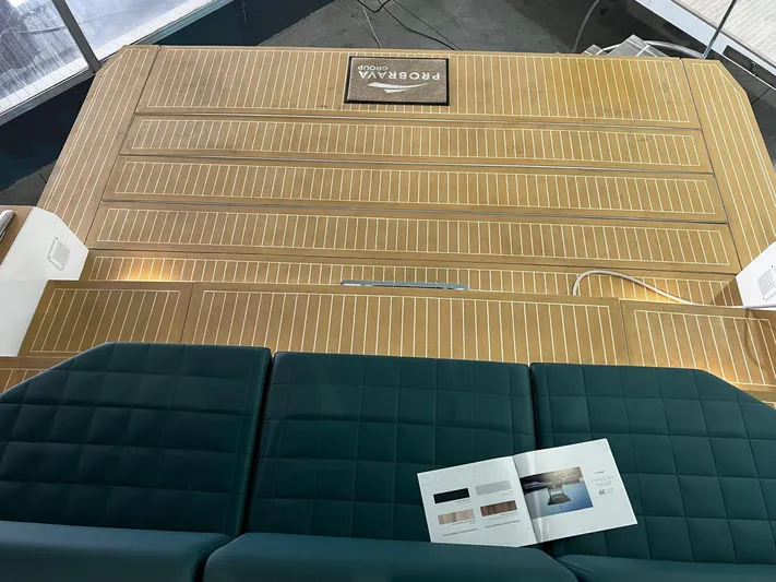 Fiart 39 Sw Yacht Photos Pics 2024 Fiart 39 Seawalker deck with teak flooring and cushioned seating.