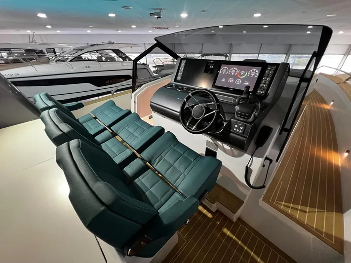 Fiart 39 Sw Yacht Photos Pics 2024 Fiart 39 Seawalker yacht interior with modern helm and seating.