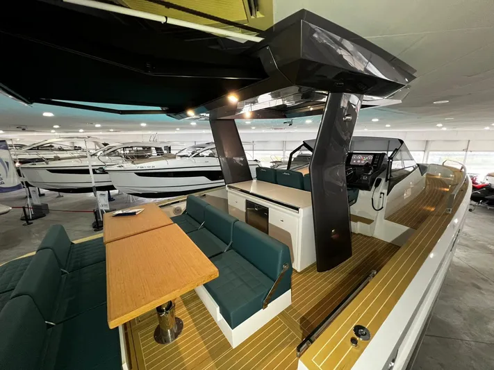 Fiart 39 Sw Yacht Photos Pics 2024 Fiart 39 Seawalker yacht interior with modern seating and wooden deck.
