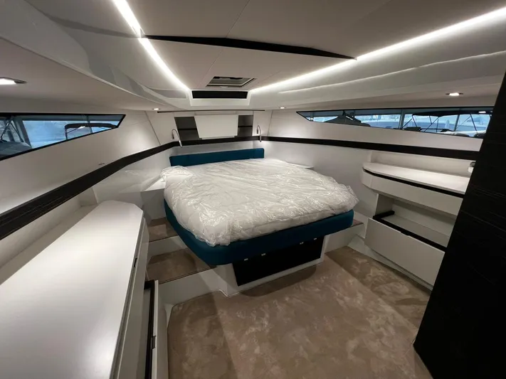 Fiart 39 Sw Yacht Photos Pics Luxurious interior of 2024 Fiart 39 Seawalker yacht with modern design and spacious bed.