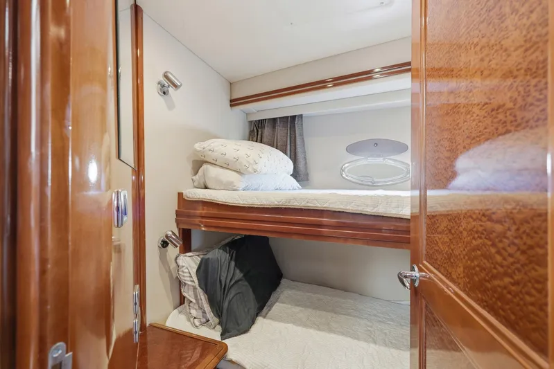 Endymion Yacht Photos Pics 2006 Carver 56 Voyager cabin with wooden interior and bunk beds.