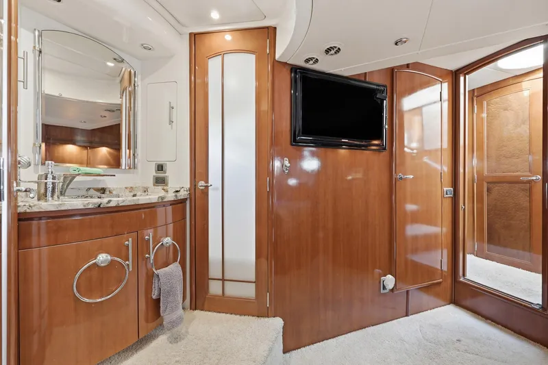 Endymion Yacht Photos Pics Luxurious 2006 Carver 56 Voyager yacht interior with elegant wood finishes and modern amenities.