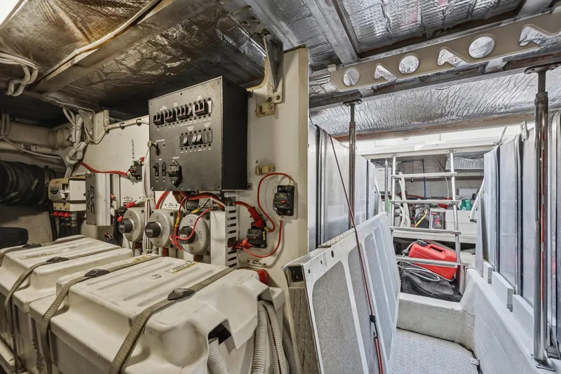 Endymion Yacht Photos Pics Engine room of 2006 Carver 56 Voyager yacht with electrical panels and equipment.