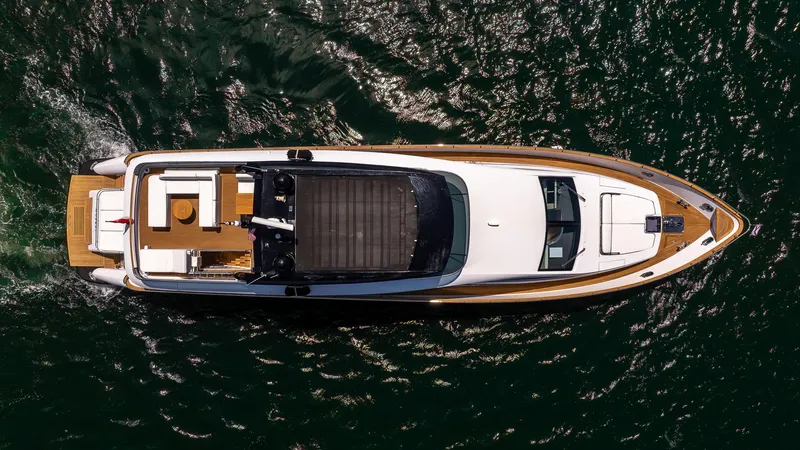 Sea Metri V Yacht Photos Pics Aerial view of 2017 Amer 94 yacht on water, showcasing sleek design and spacious deck.