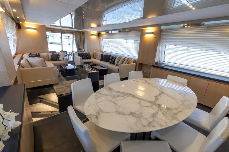 Sea Metri V Yacht Photos Pics Luxurious yacht interior with marble table, modern seating, and elegant lighting, Amer 94 model, 2017.
