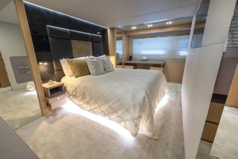 Sea Metri V Yacht Photos Pics Luxurious bedroom interior in 2017 Amer 94 yacht, featuring modern design and ambient lighting.
