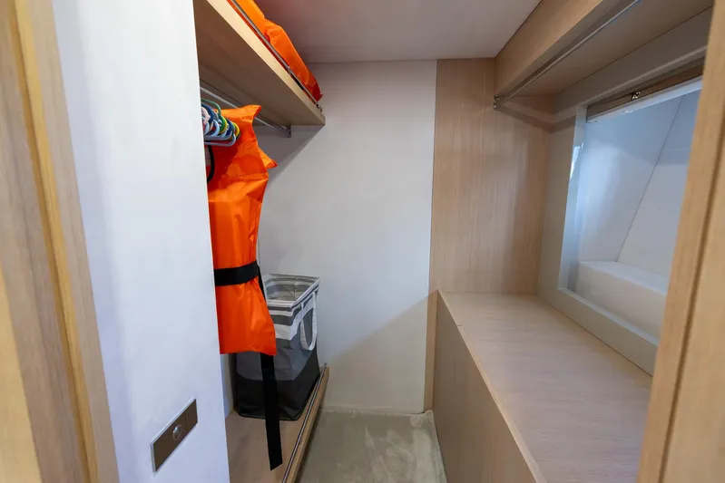 Sea Metri V Yacht Photos Pics Small yacht closet with life jackets and storage, Amer 94 model, 2017.