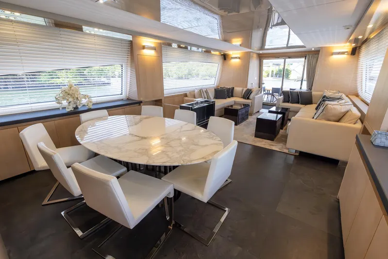 Sea Metri V Yacht Photos Pics Luxurious yacht interior with modern dining and living area, Amer 94, 2017 model.