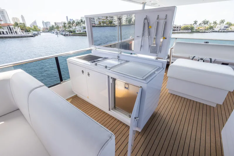 Sea Metri V Yacht Photos Pics Luxurious yacht deck with kitchenette, Amer 94 model, 2017, featuring sleek design and waterfront view.