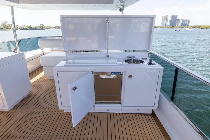 Sea Metri V Yacht Photos Pics Outdoor yacht kitchen with sink and stove on Amer 94, 2017 model, overlooking water.