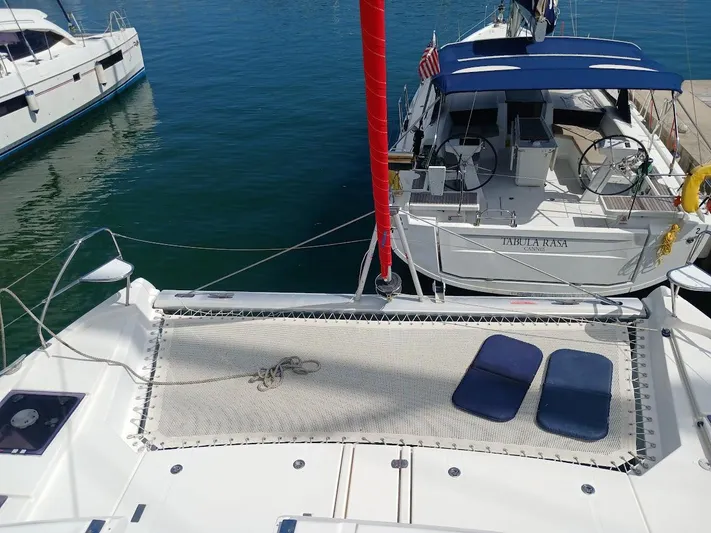 Sail La Vie Yacht Photos Pics Leopard 45 catamaran, 2019 model, docked with blue cushions on deck.
