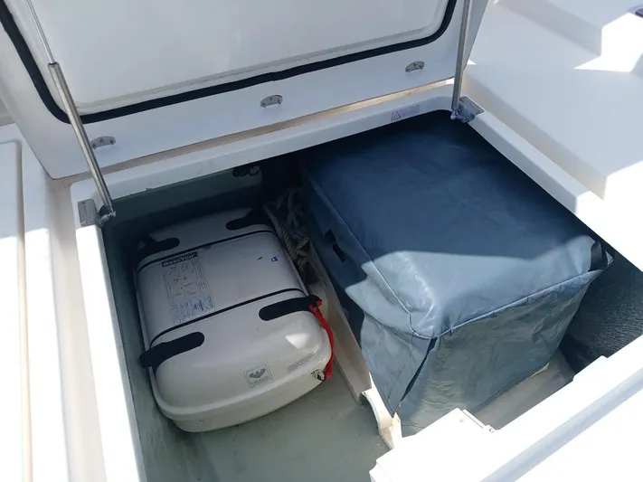 Sail La Vie Yacht Photos Pics Storage compartment on a 2019 Leopard 45 yacht with luggage and equipment.