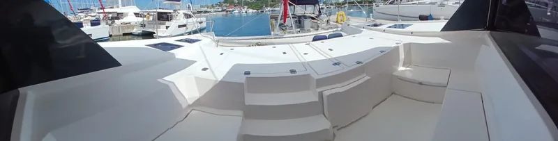 Sail La Vie Yacht Photos Pics Spacious deck of 2019 Leopard 45 yacht in marina setting.