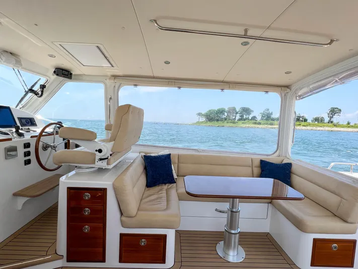 Highlander Yacht Photos Pics Interior of 2017 MJM 50z yacht with seating and ocean view.
