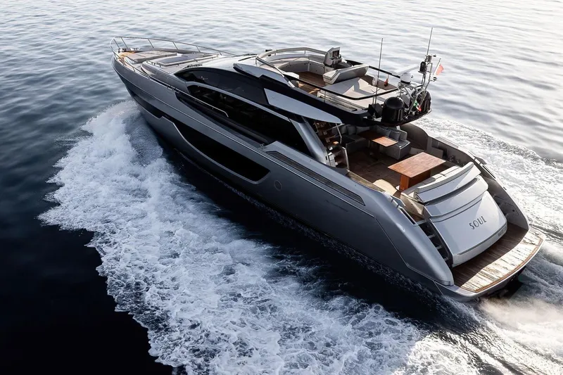  Yacht Photos Pics Luxurious 2016 Riva 76' Perseo yacht cruising on open water.