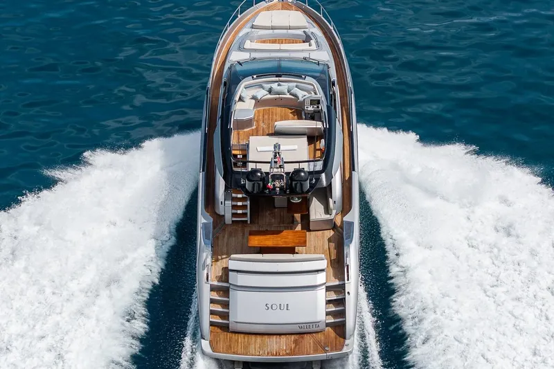  Yacht Photos Pics Luxury Riva 76' Perseo yacht cruising on open water, 2016 model.