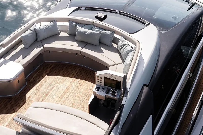  Yacht Photos Pics Luxurious 2016 Riva 76' Perseo yacht with elegant seating and control panel.