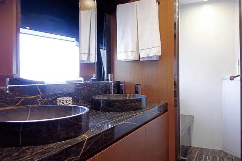  Yacht Photos Pics Luxurious bathroom with marble sinks on 2016 Riva 76' Perseo yacht.