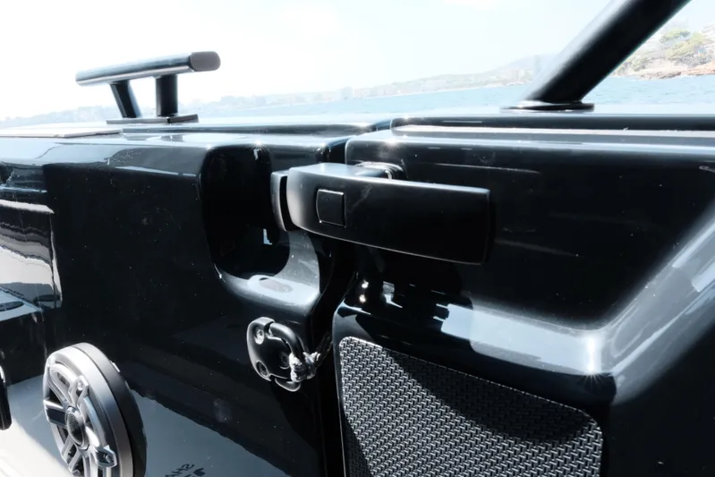 Ex Felgenhauer Yacht Photos Pics 2023 BRABUS Shadow 1200 Cross Cabin boat detail with sleek black finish and speaker.