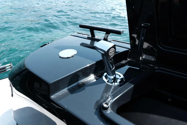 Ex Felgenhauer Yacht Photos Pics 2023 BRABUS Shadow 1200 Cross Cabin yacht detail with sleek black finish and chrome accents.