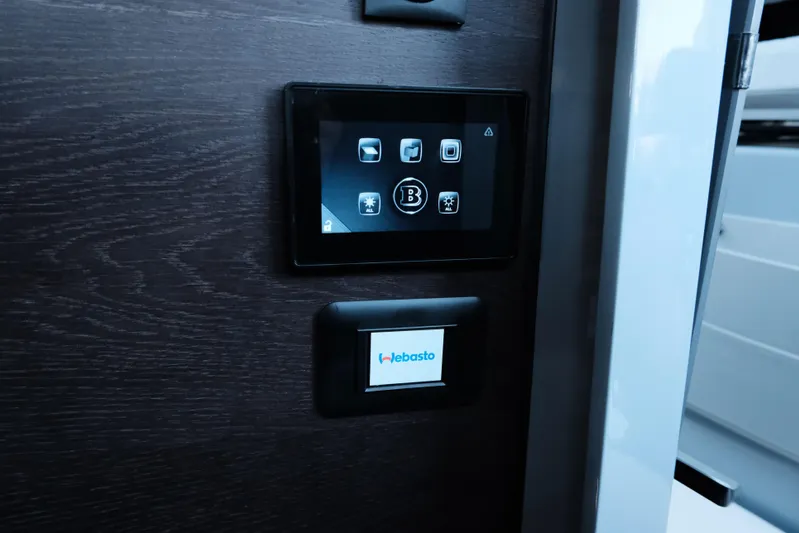 Ex Felgenhauer Yacht Photos Pics Control panel inside 2023 BRABUS Shadow 1200 Cross Cabin, featuring Webasto interface.