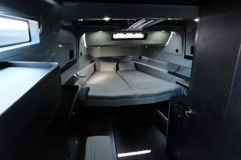 Ex Felgenhauer Yacht Photos Pics Luxurious interior of 2023 BRABUS Shadow 1200 Cross Cabin with modern design and comfortable seating.