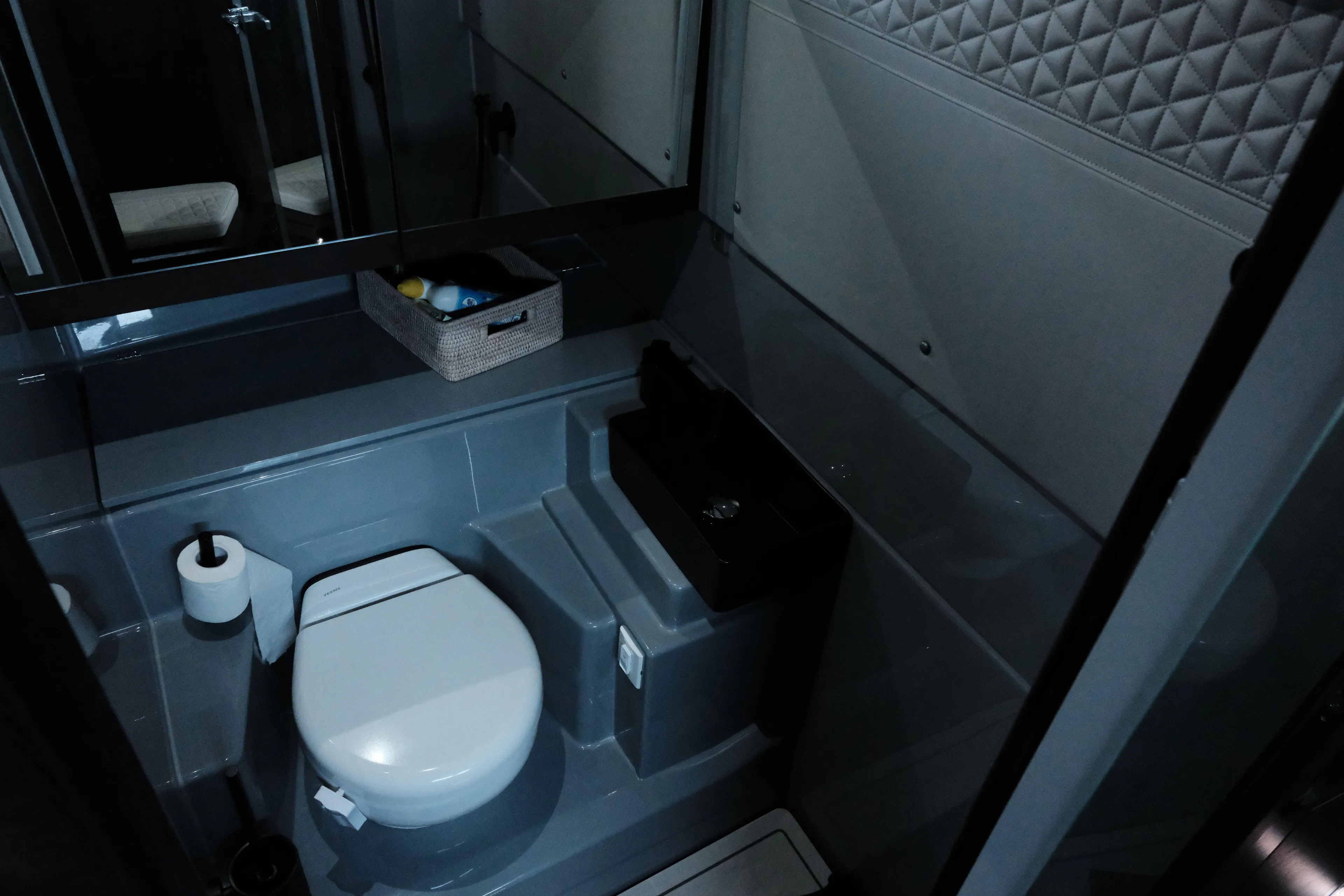 Ex Felgenhauer Yacht Photos Pics Luxurious bathroom in 2023 BRABUS Shadow 1200 Cross Cabin yacht, featuring modern amenities.