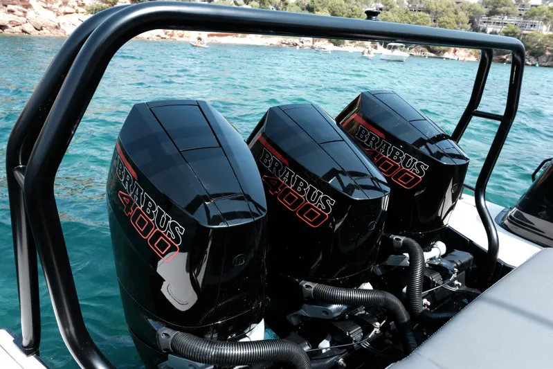 Ex Felgenhauer Yacht Photos Pics Triple BRABUS 400 engines on 2023 Shadow 1200 Cross Cabin boat, ocean backdrop.