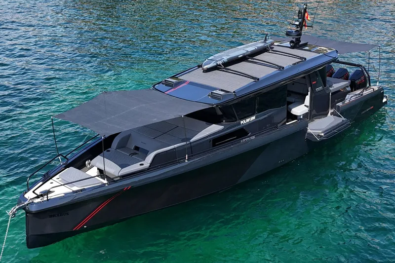 Ex Felgenhauer Yacht Photos Pics 2023 BRABUS Shadow 1200 Cross Cabin luxury boat on clear blue water.