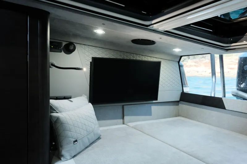 Ex Felgenhauer Yacht Photos Pics Luxurious interior of 2023 BRABUS Shadow 1200 Cross Cabin with modern amenities and sleek design.