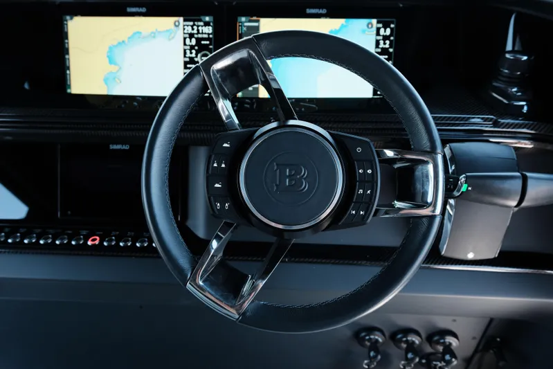 Ex Felgenhauer Yacht Photos Pics Steering wheel of 2023 BRABUS Shadow 1200 Cross Cabin with navigation screens.