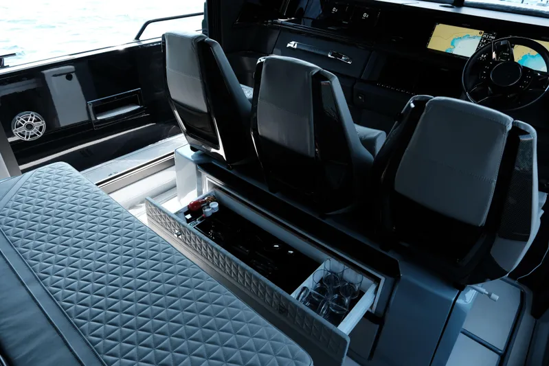 Ex Felgenhauer Yacht Photos Pics Interior of 2023 BRABUS Shadow 1200 Cross Cabin with luxury seating and navigation displays.