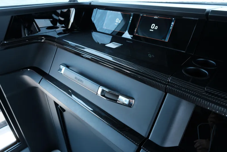 Ex Felgenhauer Yacht Photos Pics 2023 BRABUS Shadow 1200 Cross Cabin dashboard with sleek carbon fiber finish and digital displays.