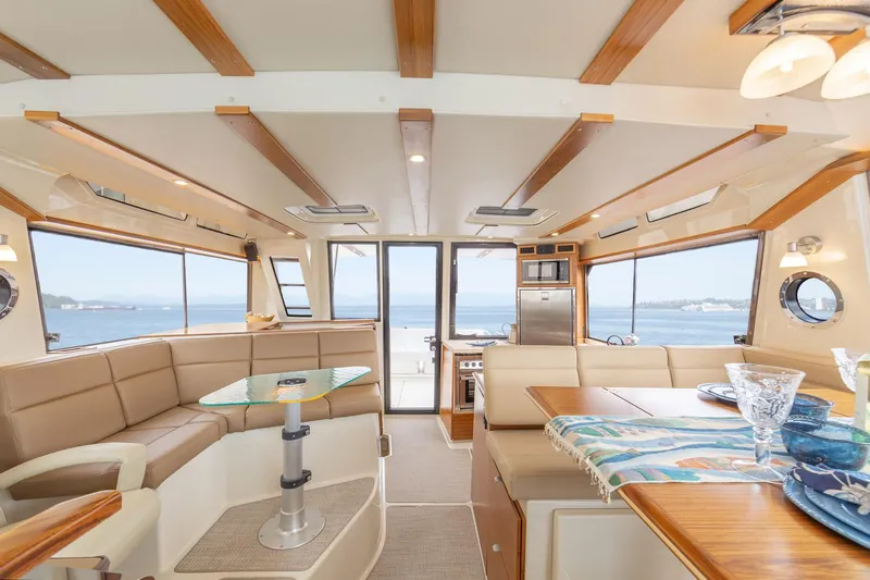  Yacht Photos Pics Luxurious interior of 2025 Ranger Tugs R-43 S yacht with ocean view.