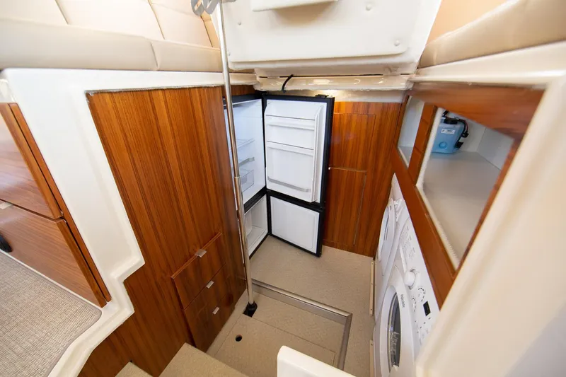  Yacht Photos Pics Interior of 2025 Ranger Tugs R-43 S with open fridge and washer.