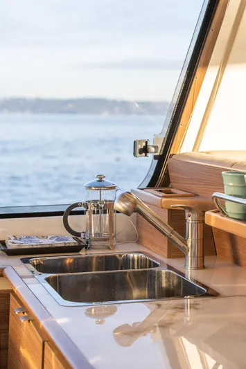  Yacht Photos Pics Modern kitchen in 2025 Ranger Tugs R-43 S yacht with ocean view.