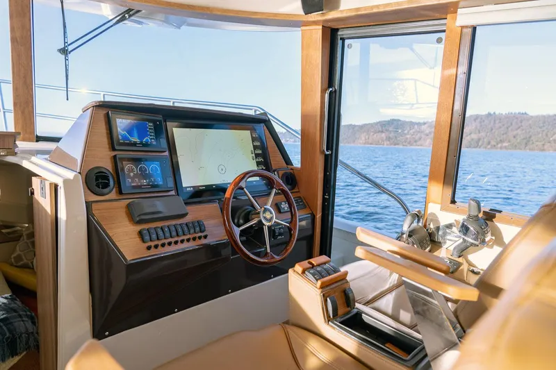 Yacht Photos Pics Interior helm of 2025 Ranger Tugs R-43 S with modern navigation equipment.