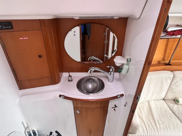 Nirvana Yacht Photos Pics Interior of 2001 Beneteau First 40.7 yacht, featuring a compact bathroom sink area.